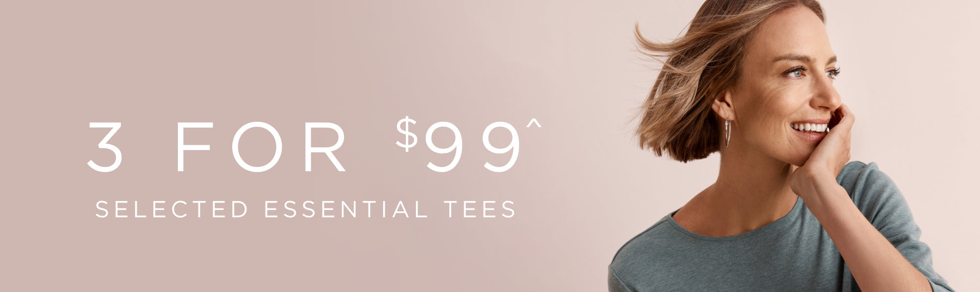 Promotional banner with a woman wearing a muted green tee and text offering a discount 3 For $99 on selected essential tees.